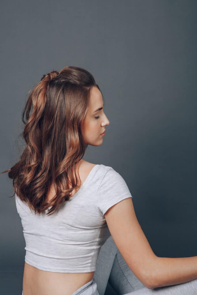 beautiful girl in the studio posing for photographer